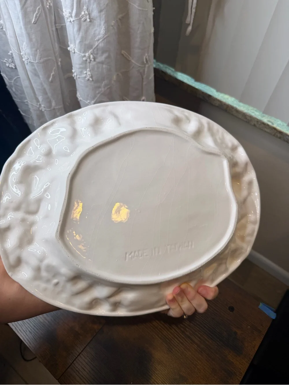White glazed ceramic oval serving platter classical bacchanalian cherub embossed